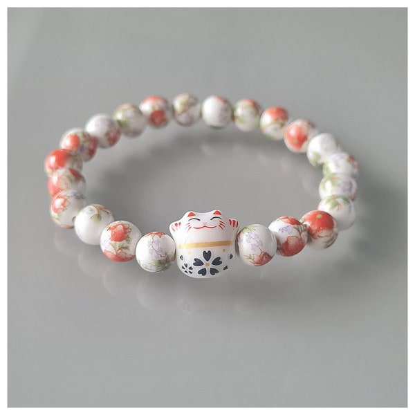 Bracelet Chat Porte Bonheur japonais Maneki Neko, bracelet chance, porte bonheur. Perles en verre et céramique.