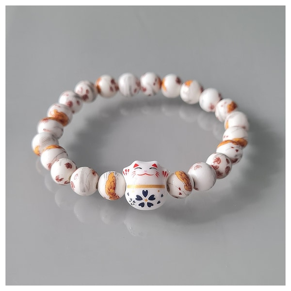 Bracelet Chat Porte Bonheur japonais Maneki Neko, bracelet chance, porte bonheur. Perles en verre et céramique.