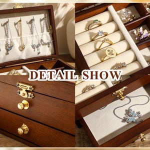 May include: A wooden jewellery box with three drawers and a hinged lid. The lid has a velvet lining with hooks for earrings and a section for necklaces. The top drawer has a velvet lining with slots for rings. The bottom drawer is empty. The box is brown with gold accents.