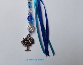 Taschenbaumler blau mit Baum