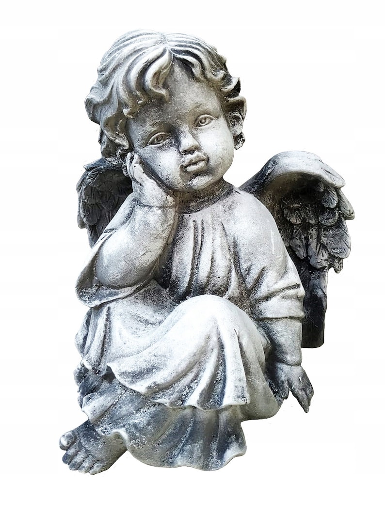 May include: A gray stone cherub statue with wings, sitting with its head resting on its hand. The cherub is wearing a long robe and has a thoughtful expression.