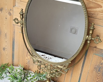 Old bronze tilting dressing table mirror