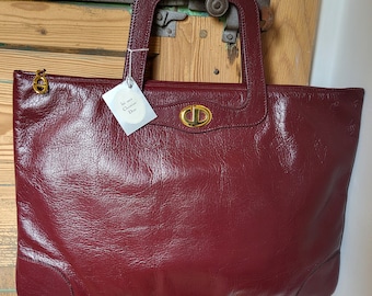 Christian Dior beautiful and authentic handbag in new burgundy leather