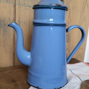 Vintage blue enameled coffee pot and teapot