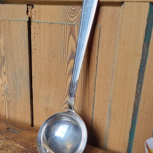 Antique large silver-plated metal ladle