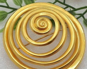 RARE magnificent imposing golden spiral swirl brooch designer MMA Metropolitan Museum of Art New York
