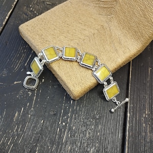 Vintage Premier Designs yellow and silver tone toggle bracelet.
