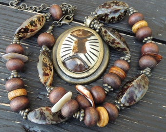 Vintage Chico&#39;s pendant necklace. Shell wooden beads.  Brass pendant with shell cabochon. Chicos