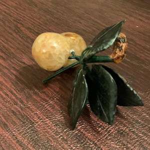 Stone -2 plums w leaves