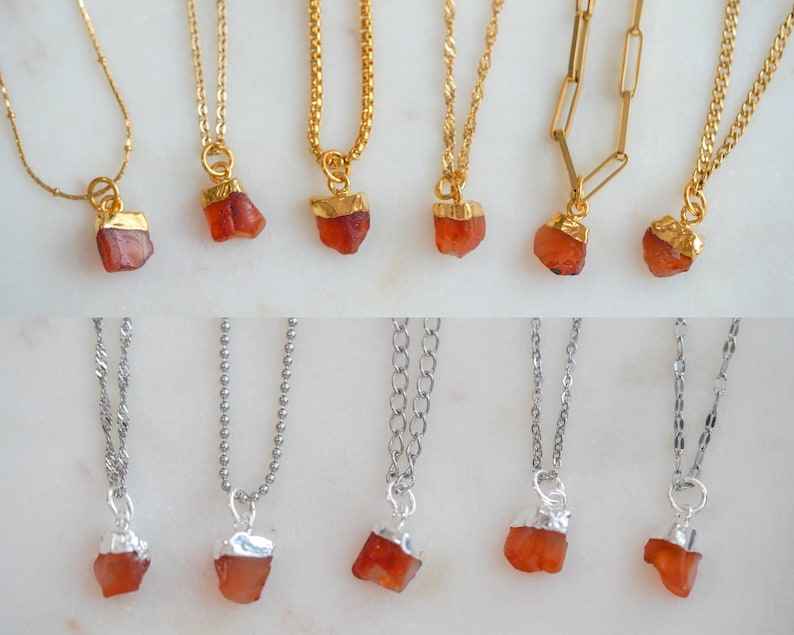 May include: A set of 10 necklaces with carnelian stone pendants. The necklaces are available in two styles: gold chain with gold-plated carnelian and silver chain with silver-plated carnelian.