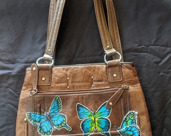 Brown leather purse with turquoise butterflies