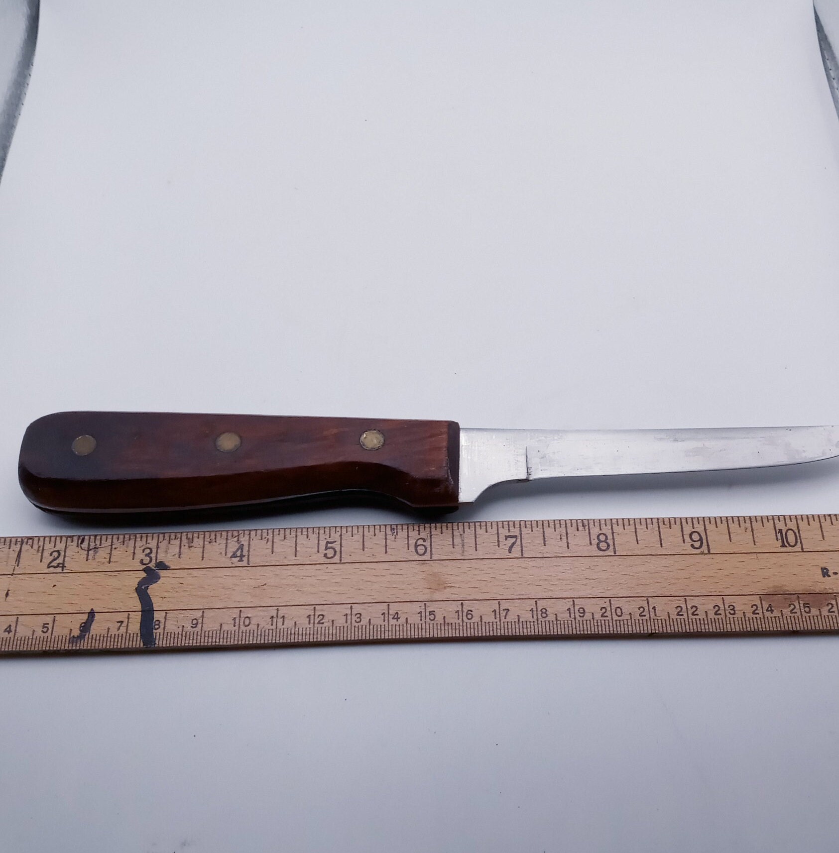 Vintage Berkley Outdoorsman metal knife with plastic sheath fillet