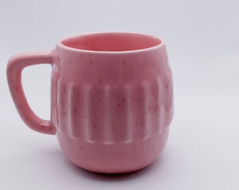 Pink and Red Speckled Ribbed Cup marked USA