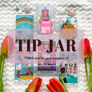 May include: A collection of tarot cards with a pink sticker that says "Tip Jar" on top of the Ace of Cups card. The cards are laid out on a white fluffy surface. The cards include the Ace of Cups, The Lovers, Two of Cups, and Queen of Cups. The text "Tip Jar" is written in large, pink letters across the middle of the image.