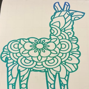 May include: A teal and green mandala llama silhouette. The llama is standing with its head turned to the right. The mandala design is intricate and detailed.