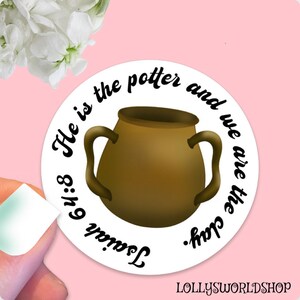 May include: White round sticker with a brown clay pot and the text "He is the potter and we are the clay. Isaiah 64:8"