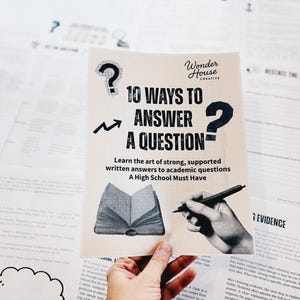 May include: A printed educational guide titled "10 Ways to Answer a Question" with a question mark graphic. The guide is held over a background of other printed papers. The guide's text includes "Learn the art of strong, supported written answers to academic questions."