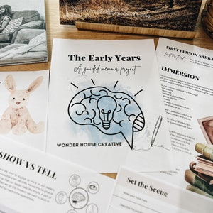 May include: A printable guide for creating a memoir about the early years of a person's life. The guide includes prompts and activities to help you remember and document your memories. The guide features a brain with a lightbulb inside, a hand drawing a line on the brain, and the text "The Early Years: A guided memoir project".