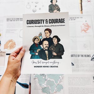 May include: A printed poster titled "Curiosity & Courage" with illustrations of historical figures. The poster includes the text "A Journey through the History of Western Science" and "Ideas that changed everything..." by Wonder House Creative.