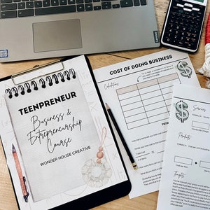 May include: A black and white printable worksheet titled "Teenpreneur Business & Entrepreneurship Course" with a watercolor illustration of a white pom-pom with brown wooden beads. The worksheet is on a clipboard with a gold binder clip. The worksheet is titled "Cost of Doing Business" and includes a table for calculating materials and services costs.