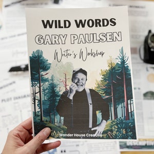 May include: A white flyer with a green and blue forest background. The flyer advertises a "Wild Words" writer's workshop with Gary Paulsen. The text "Wonder House Creative" is at the bottom of the flyer.