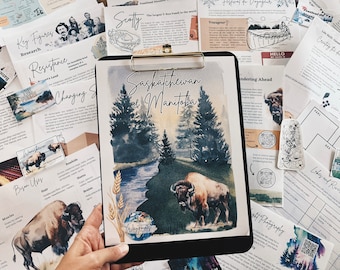 May include: A watercolor illustration of a forest scene with a river and a bison. The illustration is on a clipboard with the words "Saskatchewan & Manitoba" written at the top. The words "Waypoints" are written in a circle at the bottom of the illustration.