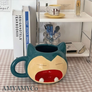 Taza de agua de cerámica de dibujos animados azules de gran capacidad Taza