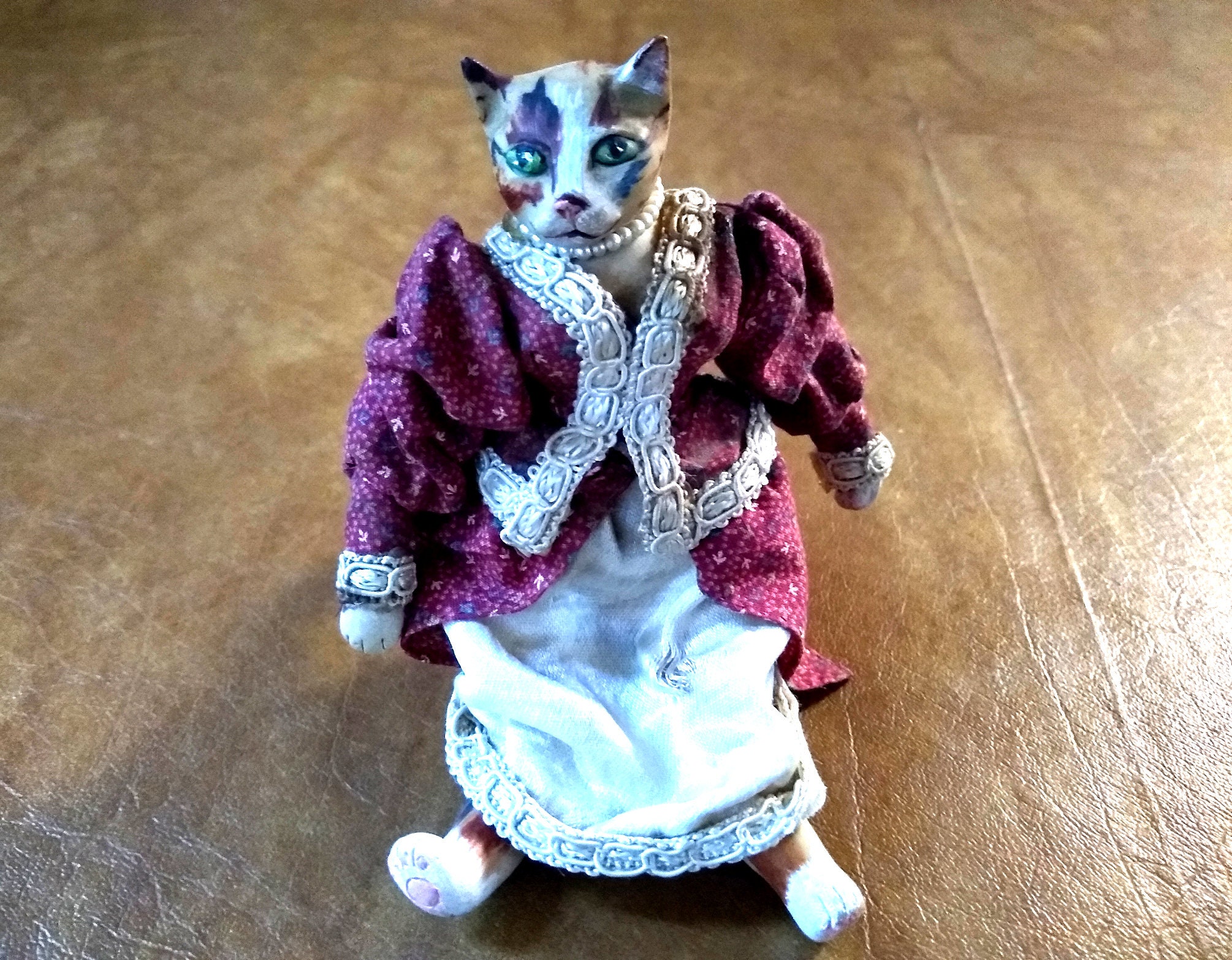 Vintage Sitting Cat Doll Wearing a Pearl Style Necklace and a