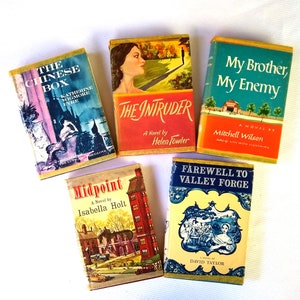 May include: A collection of five vintage paperback books with colorful covers. The titles include "The Chinese Box", "The Intruder", "My Brother, My Enemy", "Midpoint", and "Farewell to Valley Forge".