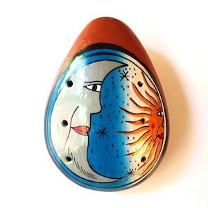South American Clay Whistle Painted with the Moon and the Sun on the Top and the Bottom is Molded Like a Face, Unique Moon and Sun Whistle