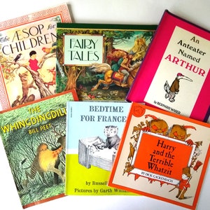May include: A collection of children's books with colorful covers. The titles include "The Aesop for Children", "Fairy Tales", "An Anteater Named Arthur", "The Whingdingdili", "Bedtime for France", and "Harry and the Terrible Whatzit".