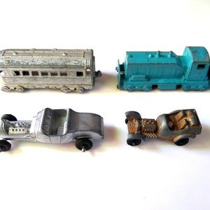 Four Vintage Diecast Midgetoys Rockford ILL and Tootsietoy, Two Midgetoy Train Cars, One Midgetoy Hot Rod, One Tootsietoy Hot Rod