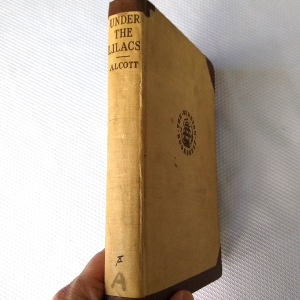 Under the Lilacs 1934 Vintage Book by Louisa May Alcott, This is a former Library book from Scott Lane School