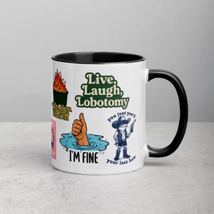 May include: White ceramic mug with a black interior and handle. The mug features several humorous graphics and text, including "Live, Laugh, Lobotomy," "I'm Fine," and a cowboy frog. The mug is a fun gift idea.