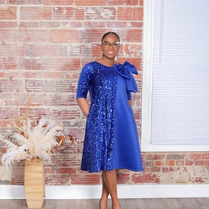 bow blue sequinned line dress Dance With Destiny Light Blue Floral Jacquard Bow Front Mini Dress
