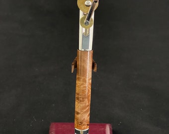 Piston Pen, in Chrome Brass. Made with Stabalized Maple Burl