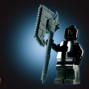 May include: A black Lego minifigure with a gold Roman numeral IV on its head, holding a large, gray, chain-saw axe with a wooden handle.