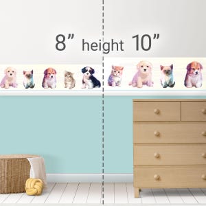 May include: A decorative border featuring watercolor illustrations of puppies and kittens. The border is 8 inches (20 cm) high and 10 inches (25 cm) wide, with a light blue background and a wooden dresser.