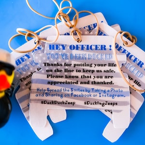 Officer/You&#39;ve Been Ducked/ LAMINATED tags/ Rectangular/ Rubber bands attached/ Set of 12