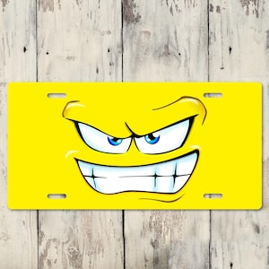 Attitude Face on Yellow Background - License Plate