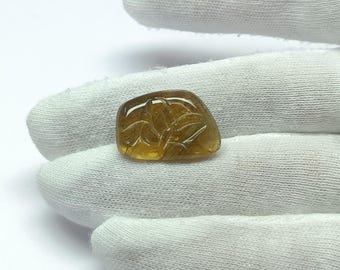 Yellow tourmaline carving loose stone for jewelry making items.