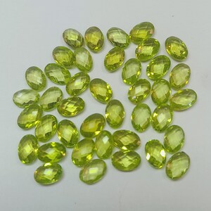 Peridot faceted gemstone 4×6mm oval berolite cut stone for jewelry making items.