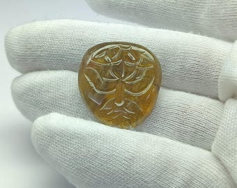 Yellow tourmaline faceted carving loose gemstone for jewelry making.