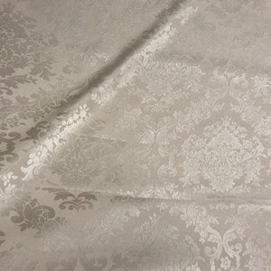 San Leucio damask fabric with champagne medallions in a satin cotton blend