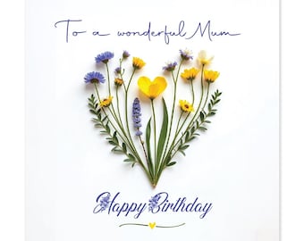 May include: A white greeting card with the text "To a wonderful Mum" and "Happy Birthday" in blue script. The card features a heart-shaped arrangement of yellow, blue, and white flowers with green foliage.