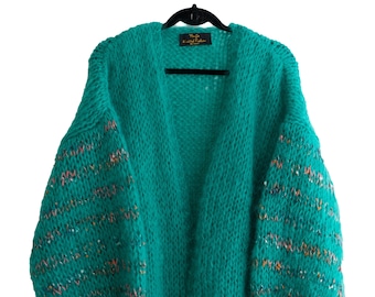 Handknitted green mohair cardigan with coloured accents