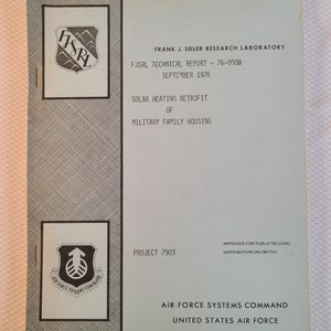 May include: A vintage technical report titled "Solar Heating Retrofit of Military Family Housing" from the Frank J. Seiler Research Laboratory. The report, dated September 1976, features the Air Force Systems Command logo and the text "Approved for Public Release".