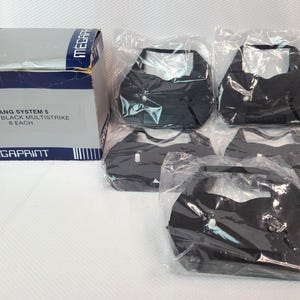 May include: A box labeled "WANG SYSTEM 5 BLACK MULTISTRIKE 6 EACH" next to several black items in plastic packaging. The box is gray and white with blue accents and the "MEGAPRINT" logo. The black items have a unique shape.