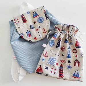 Sac à dos et Pochon rangement, en velours côtelé bleu, motif marin, pour maternelle, crèche, nounou, vacances, rentrée, vendu à l'article.