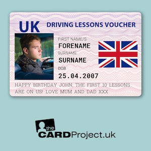 May include: A pink and white driving lessons voucher with a photo of a young man driving a car. The voucher has the text "UK Driving Lessons Voucher" at the top and includes the text "Happy Birthday John, the first 10 lessons are on us! Love Mum and Dad XXX".